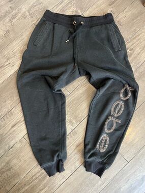 bebe Black womens Jogger Sweatpants with Studded Logo Accent